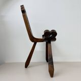 Brutalist hand carved oak Spanish tripod chair , 1970s