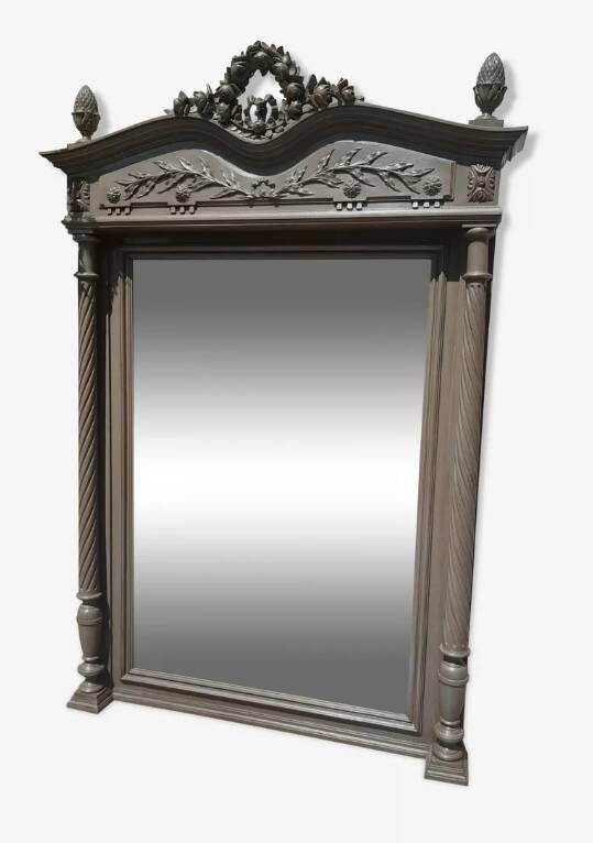 Antique carved mirror with a grey-green patina, Louis XVI style.