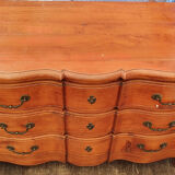 Crossbow chest of drawers with caramel patina