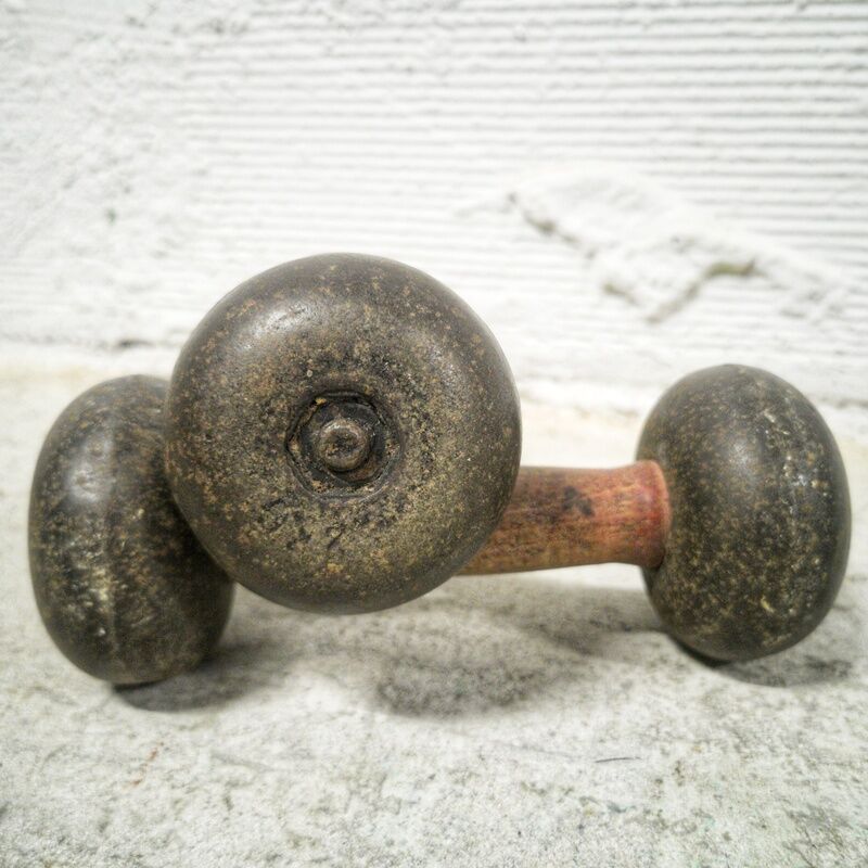 Pair of vintage dumbbells in cast iron and wood
