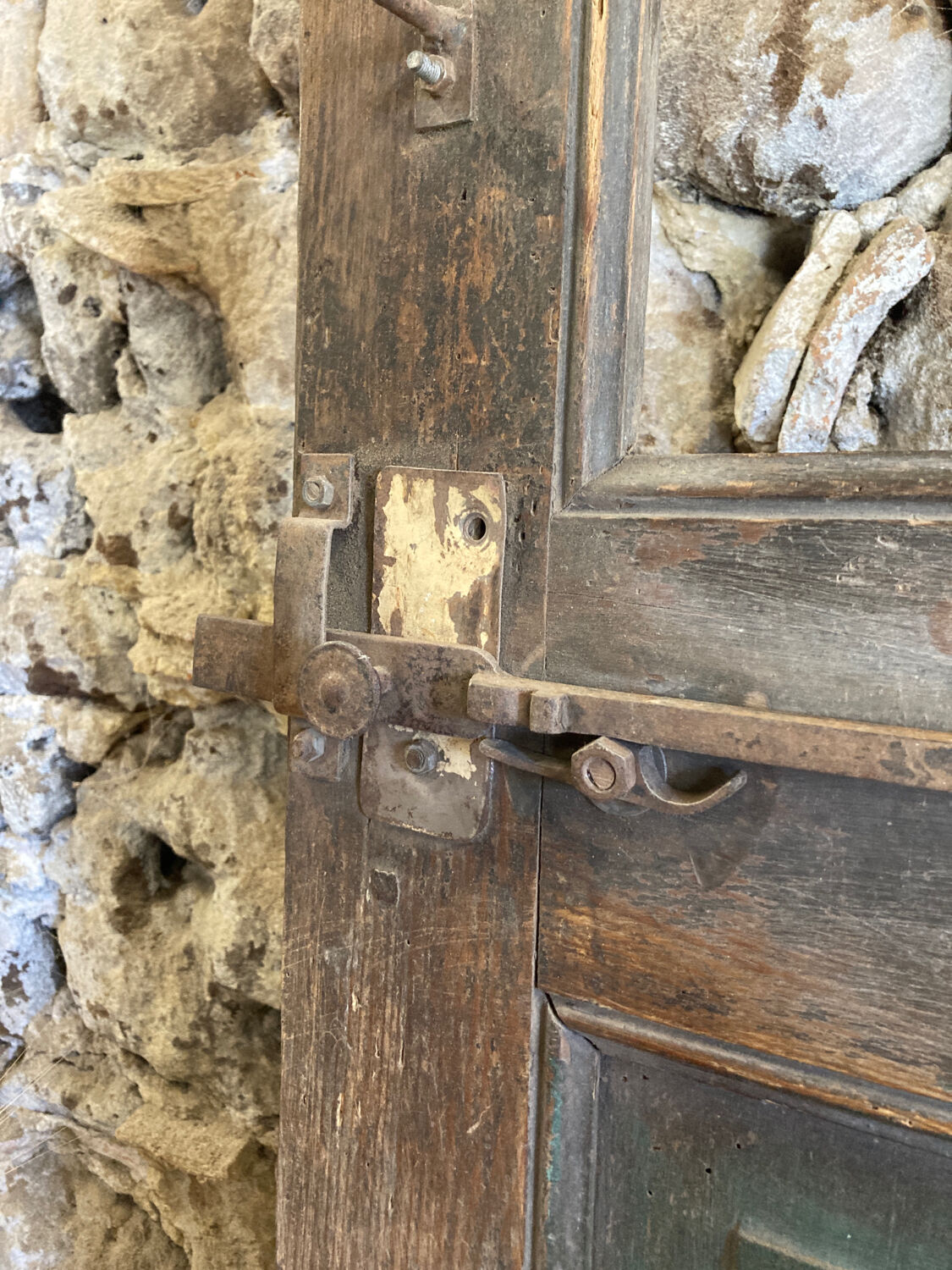 Old glazed wooden door patinated