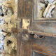 Old glazed wooden door patinated