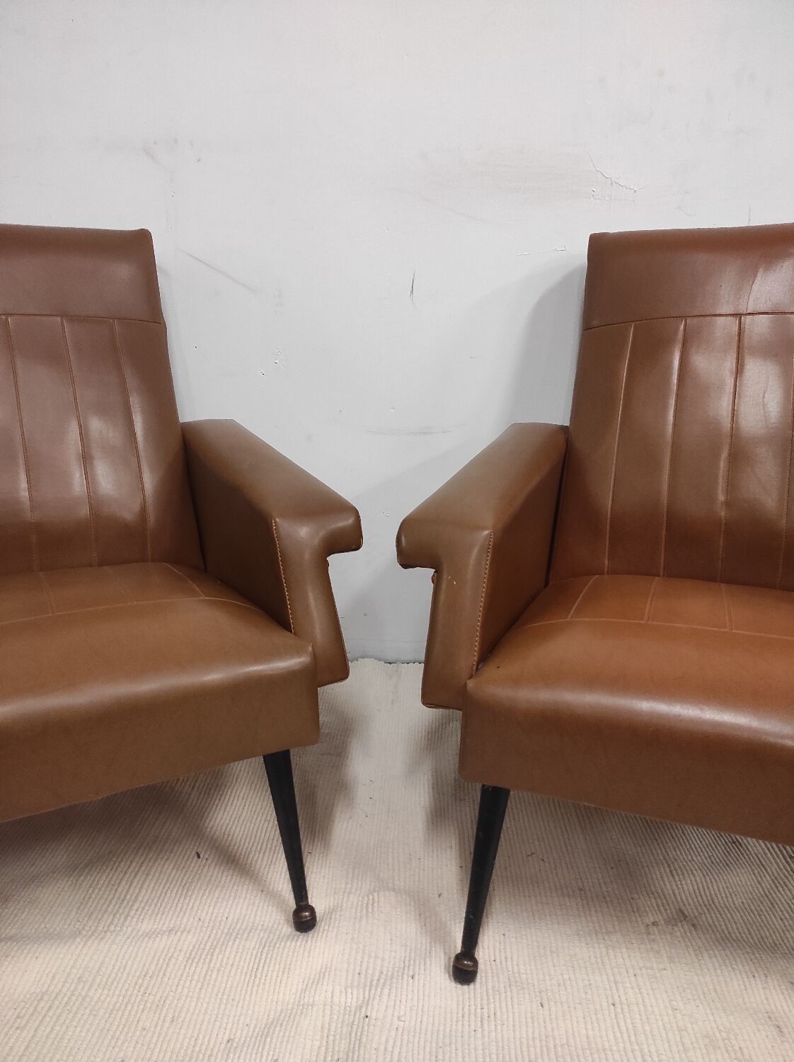 Pair of vintage leatherette armchairs