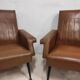 Pair of vintage leatherette armchairs
