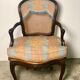 Convertible armchairs Louis XV era in walnut moulded and cannes