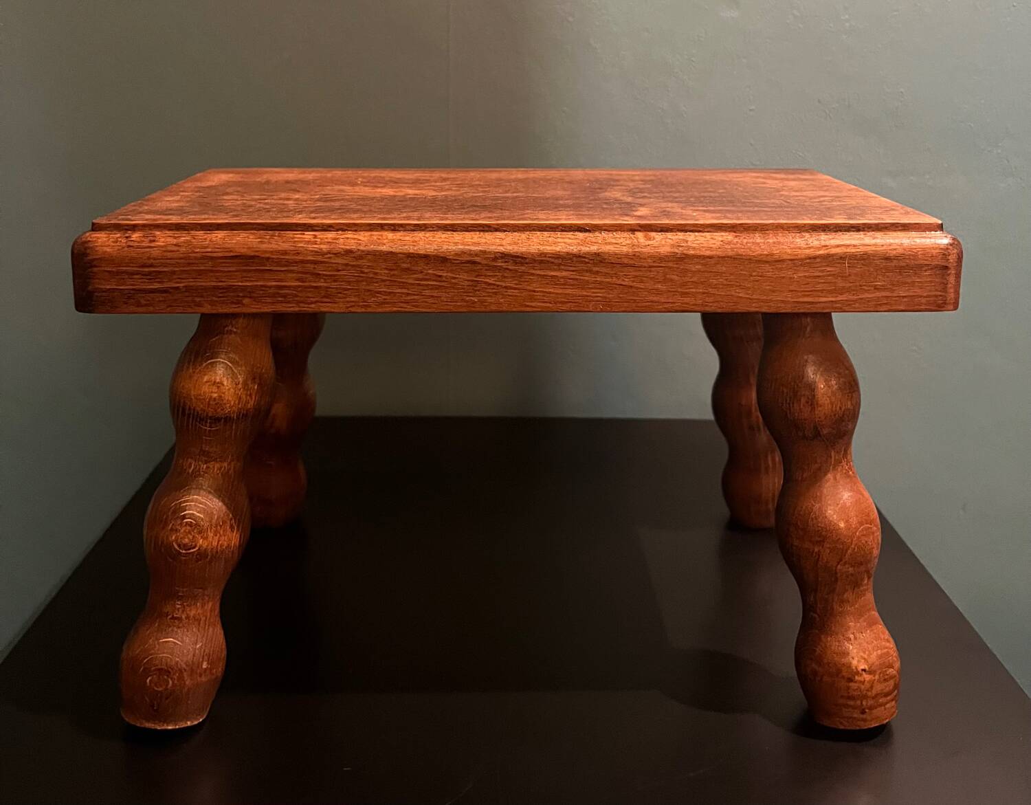 Small wooden stool or footrest