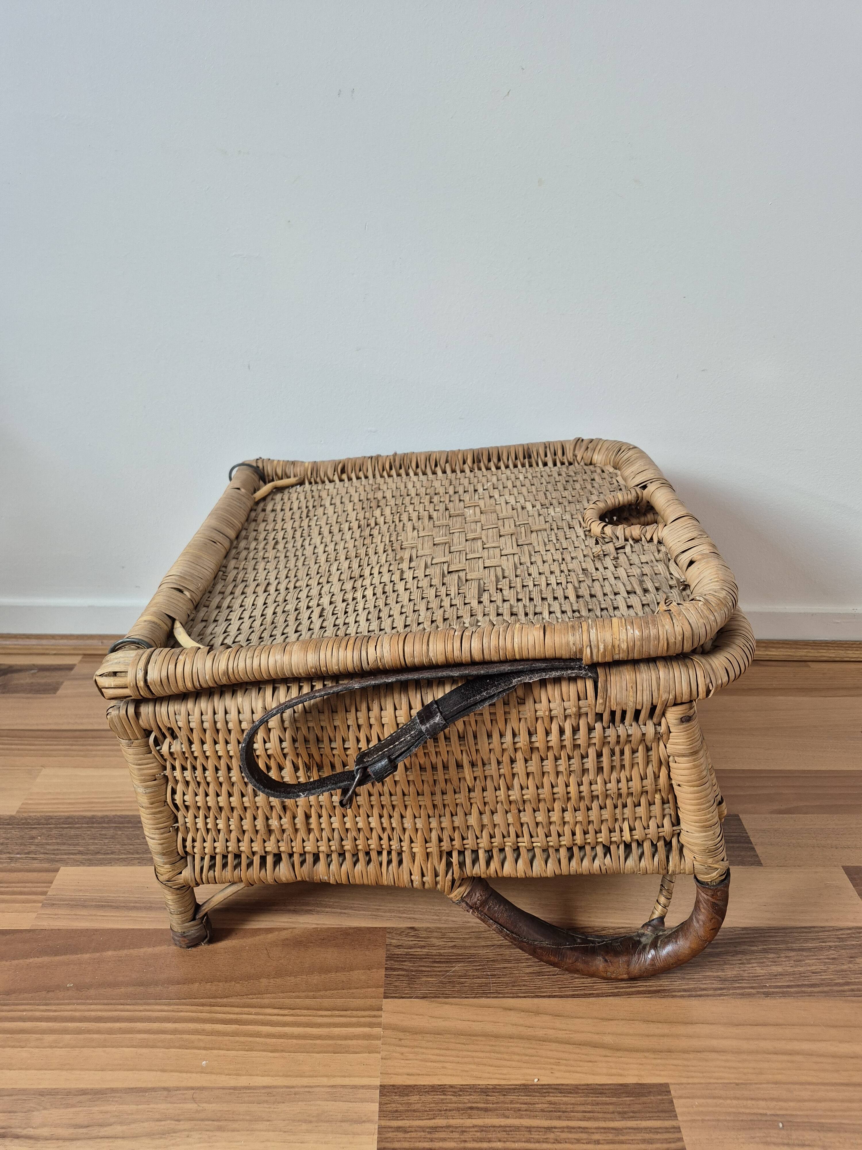 Vintage foldable beach chair, picnic in rattan and leather.