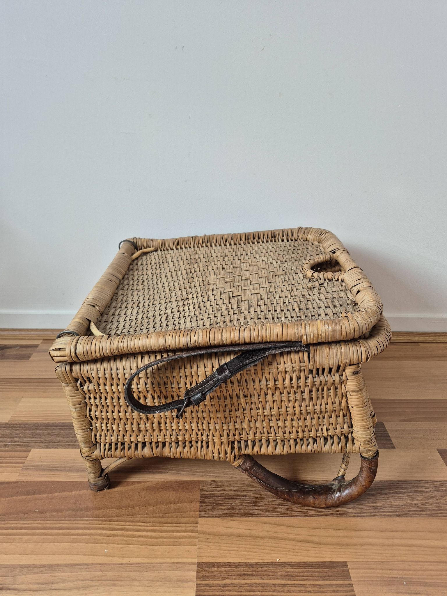 Vintage foldable beach chair, picnic in rattan and leather.