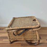 Vintage foldable beach chair, picnic in rattan and leather.