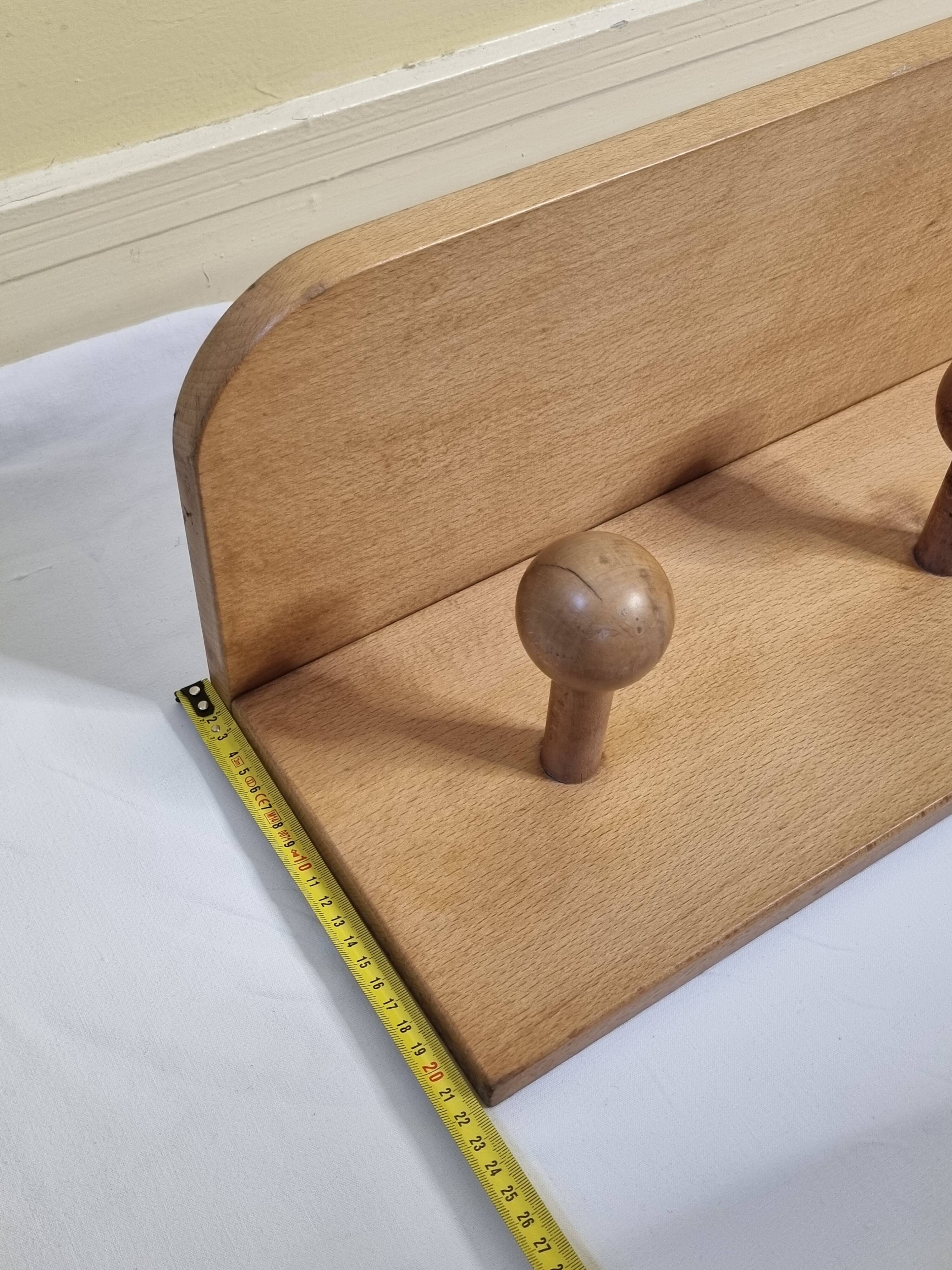 Wall-mounted coat rack, alpine design