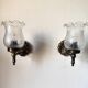 Pair of wall sconces in bronze with opaline glass tulips.