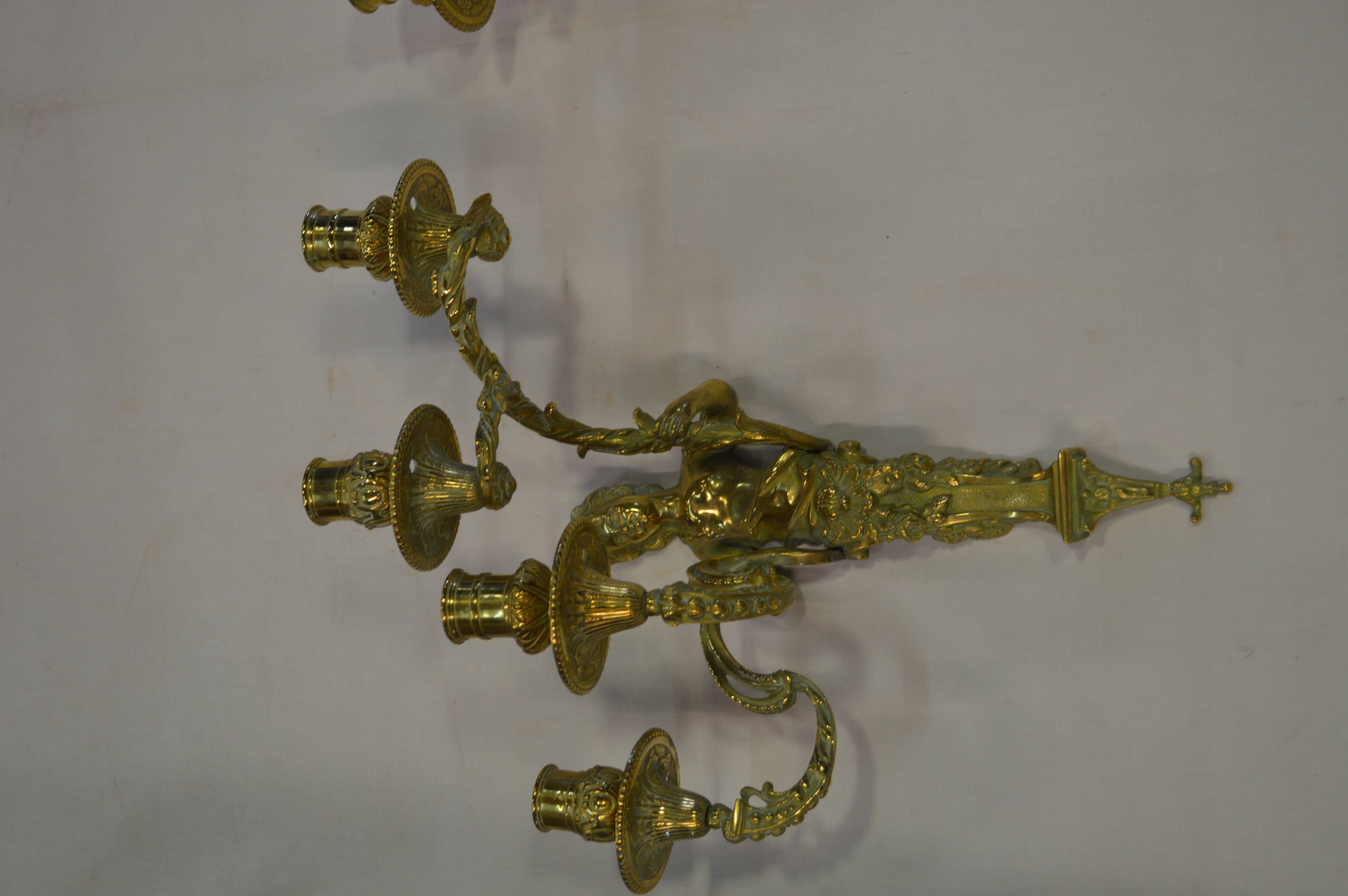 Louis XV style bronze sconces with cariatids