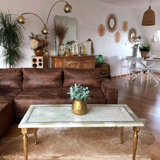 Coffee table in onyx and brass
