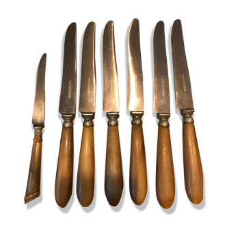 Lot of 6 knives and 1 butter knife or cheese