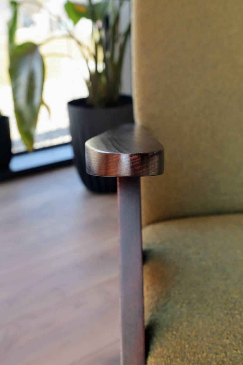 Vintage armchair in moss green bouclé design by H. Lis.