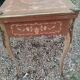 Antique game table in Louis XVI style with marquetry.