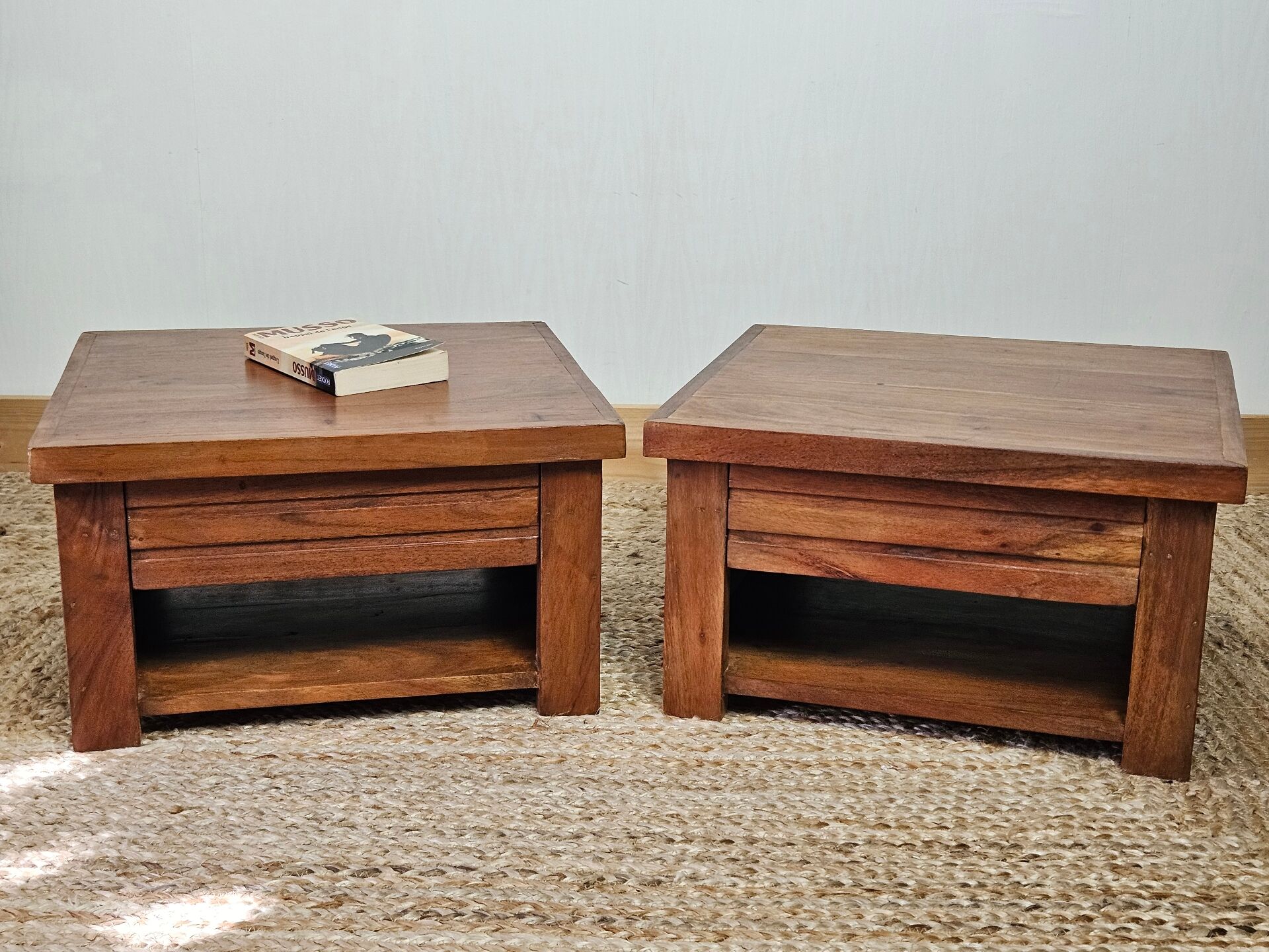 Pair of handcrafted walnut bedside tables from the 20th century.