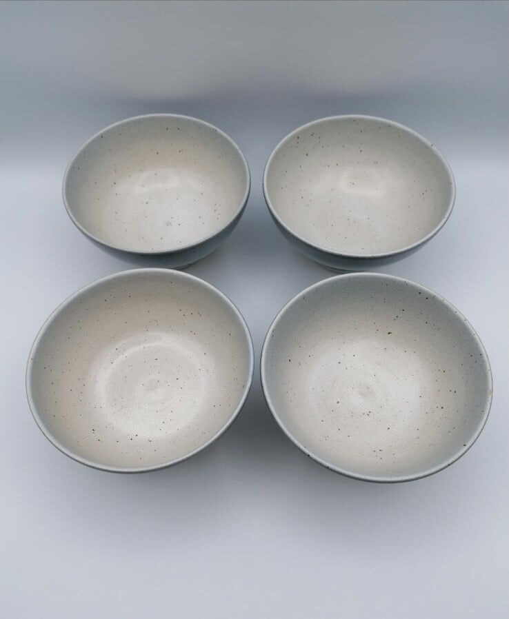 Four bowls in midnight blue sandstone