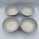 Four bowls in midnight blue sandstone