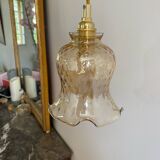 Baladeuse avec globe vintage en verre ambré