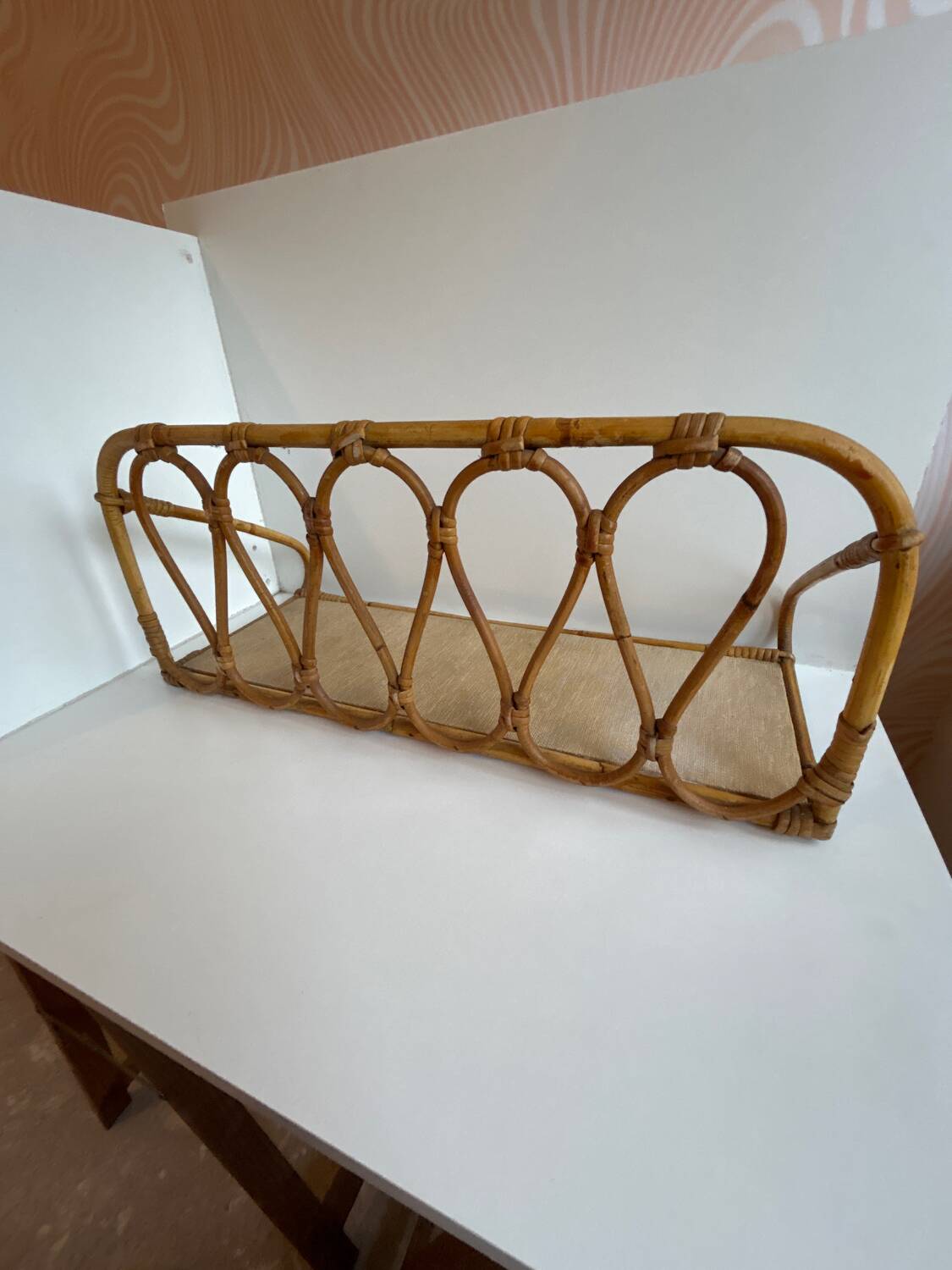 Rattan wall shelf