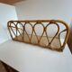 Rattan wall shelf