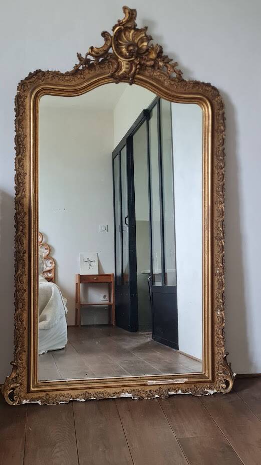 Antique Louis Philippe mirror with a pediment.