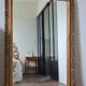 Antique Louis Philippe mirror with a pediment.