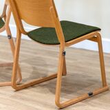 A set of four chairs in light oak (Theo chairs by Chorus)