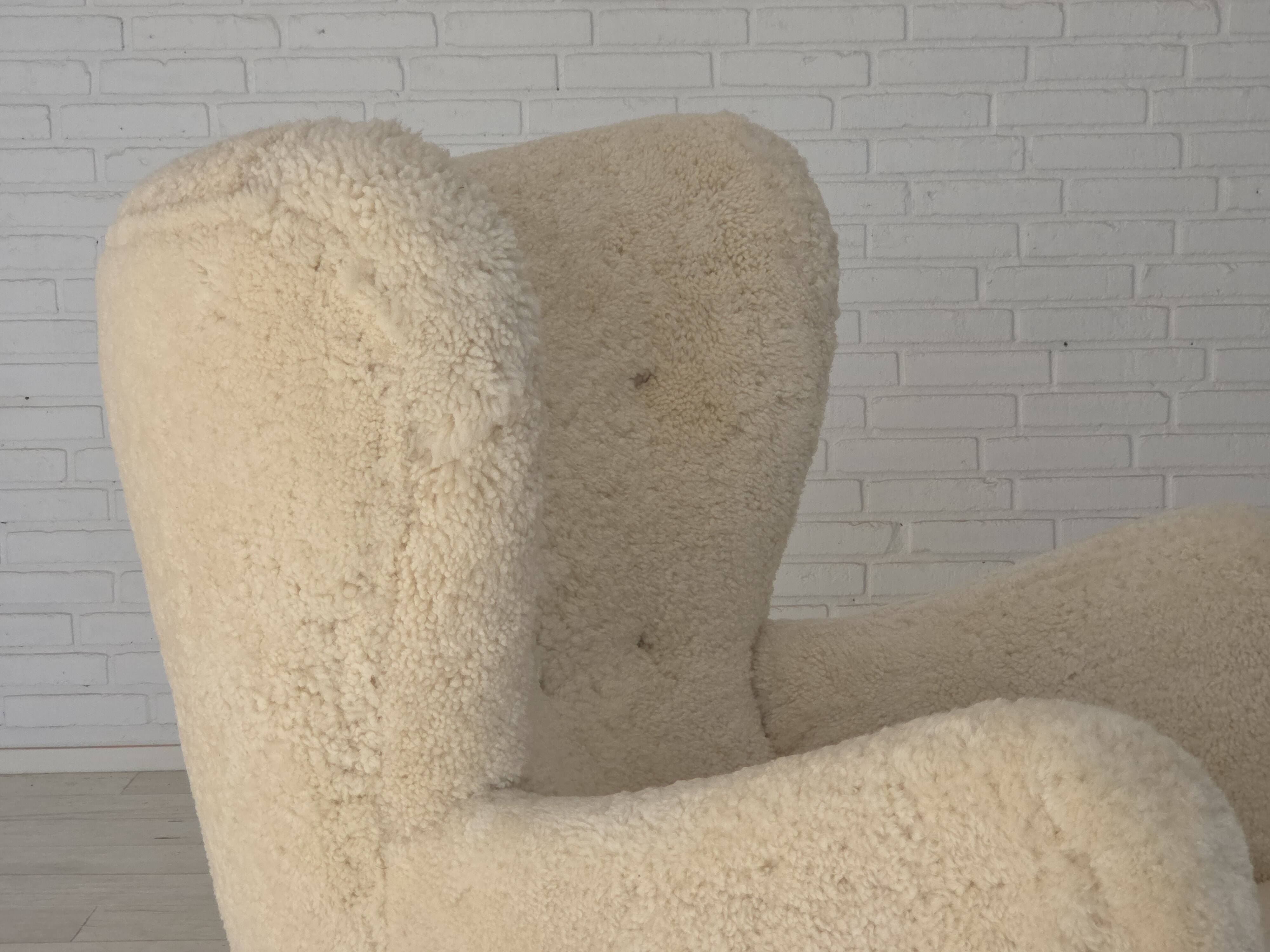 1960s, Danish armchair, genuine sheepskin "Canberra", reupholstered.