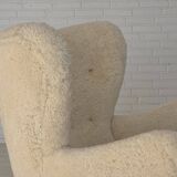 1960s, Danish armchair, genuine sheepskin "Canberra", reupholstered.