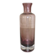 Plum-colored glass bottle with bubble