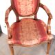 Pair of Louis XVI style cabriolet armchairs with medallion