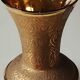 Ball vase stamped Verrerie de Monaco/Monte Carlo. In gold granite glass