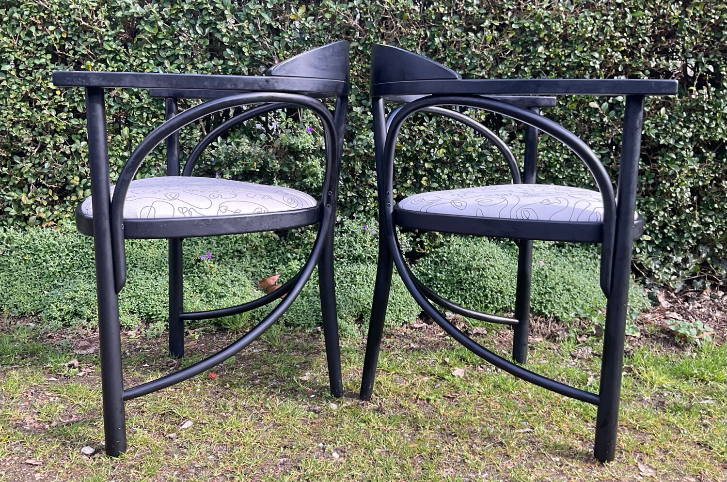 Pair of Thonet armchairs model 225 in stained black beech.
