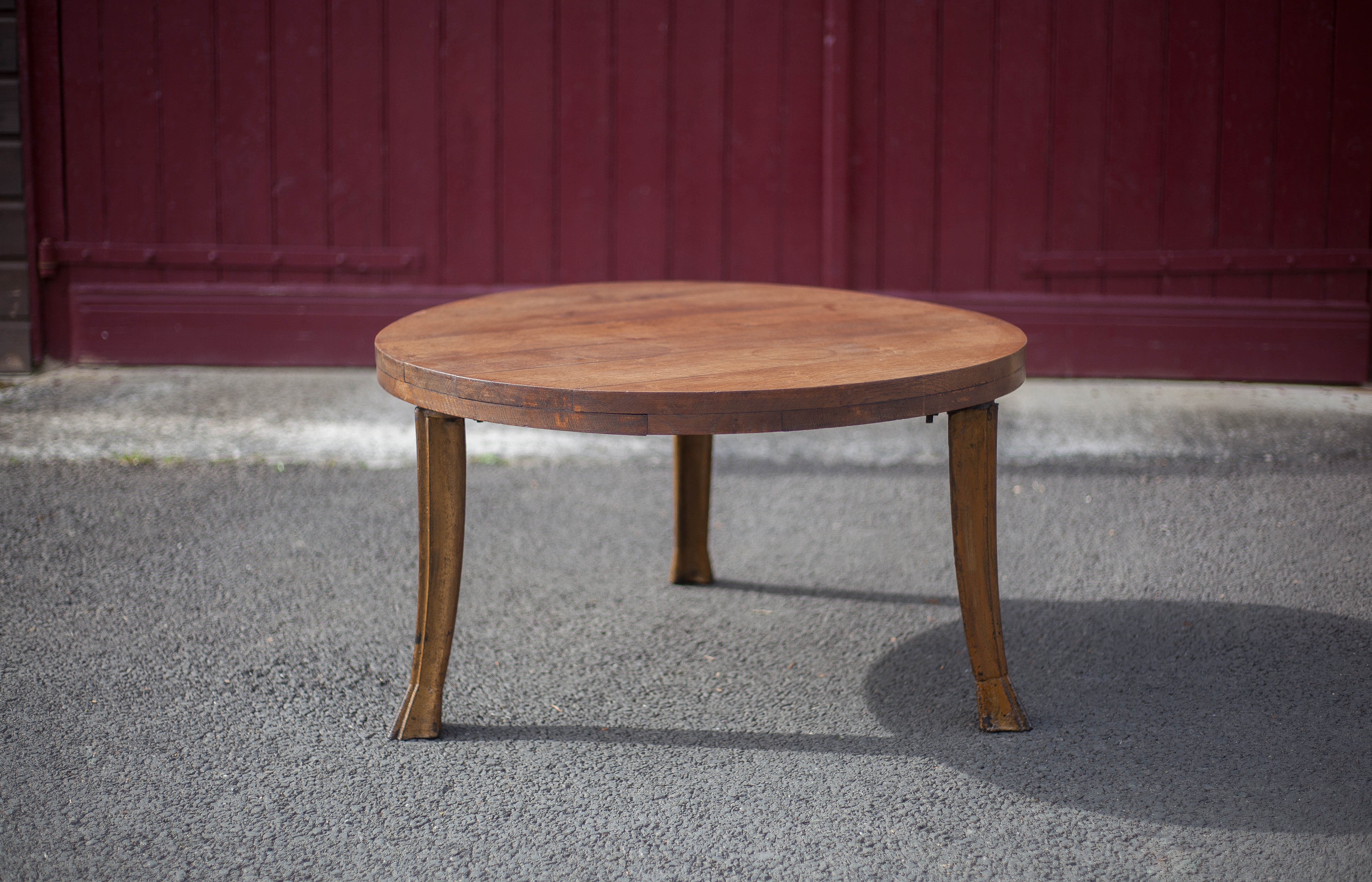 Wooden coffee table with cast iron legs