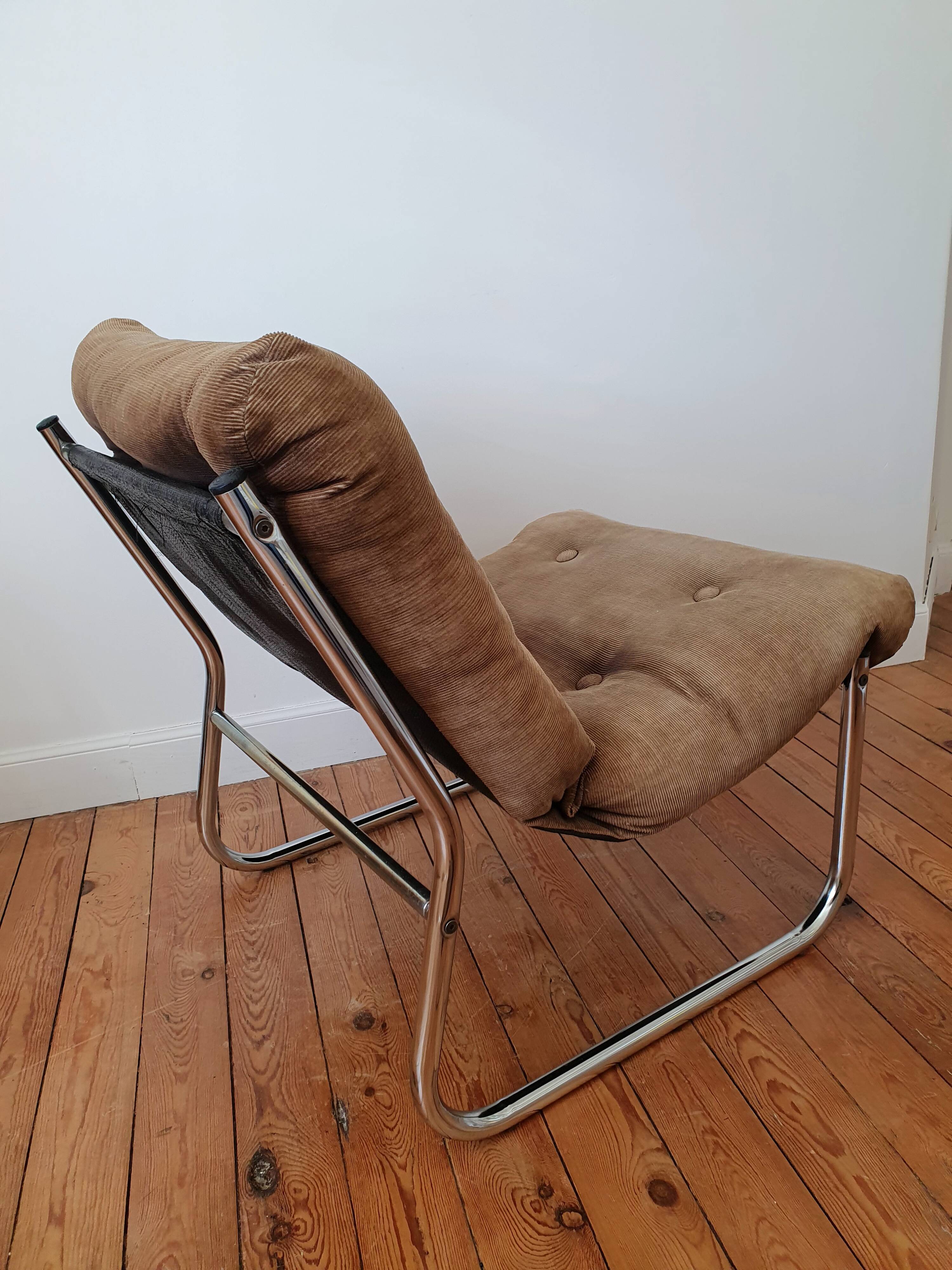 Vintage tubular chrome and velvet armchair