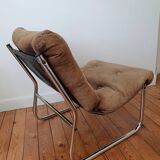 Vintage tubular chrome and velvet armchair