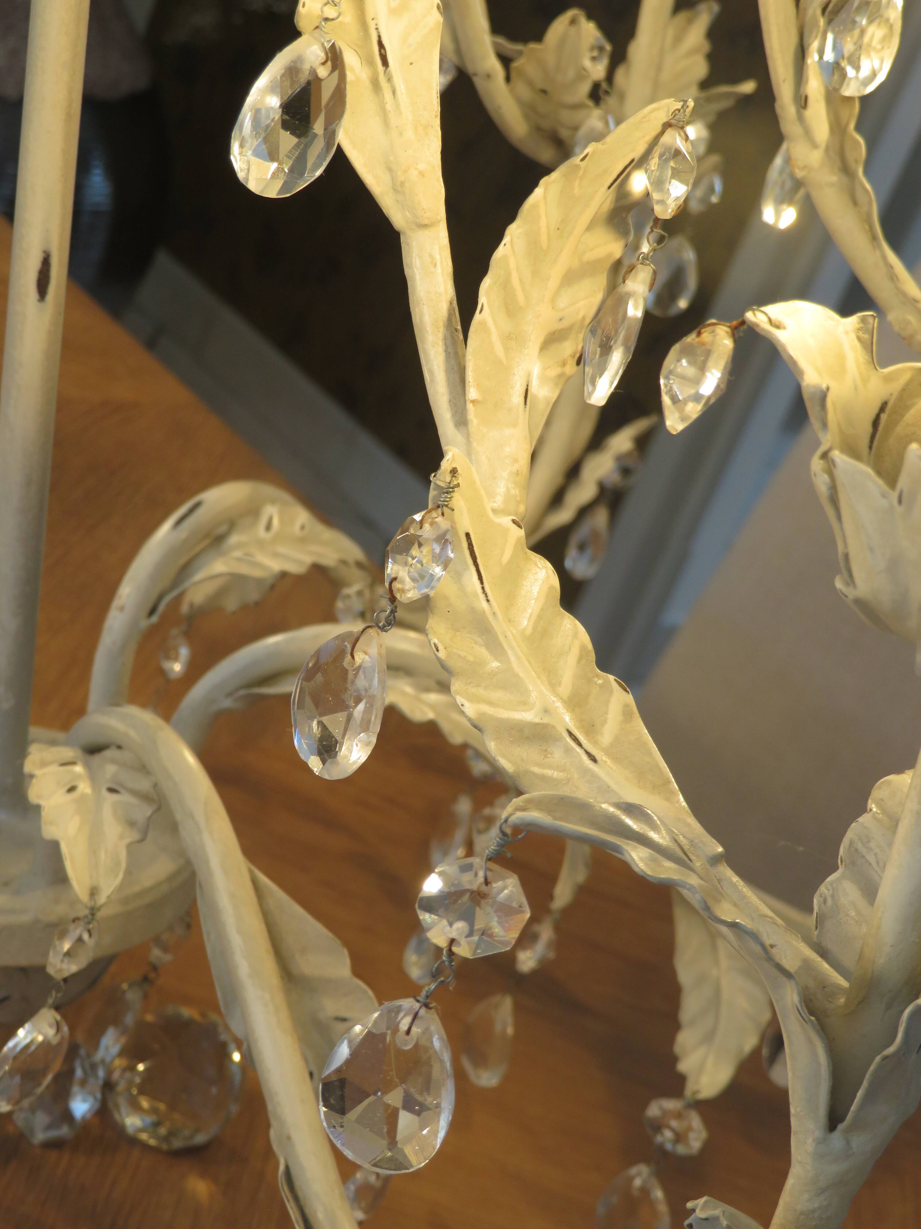 Large cage chandelier in aged metal.