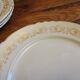 16 flat gold plates from Orchies porcelain