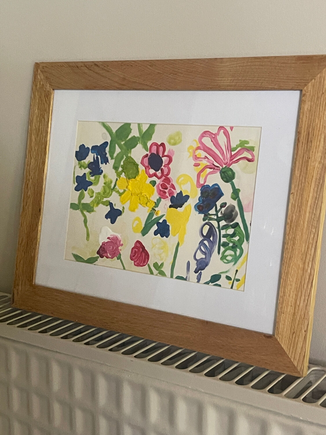Flower painting in an antique frame