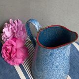Old enamelled pitcher