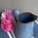 Old enamelled pitcher