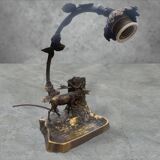 Metal table lamp with a deer on the front
