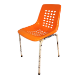 Chair with openwork plastic shell 1970