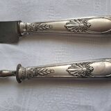 Couvert à gigot en métal argenté.