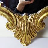 Vintage Rococo wall mirror, gold, Italy, circa 1950-1970, wood and gilded stucco.