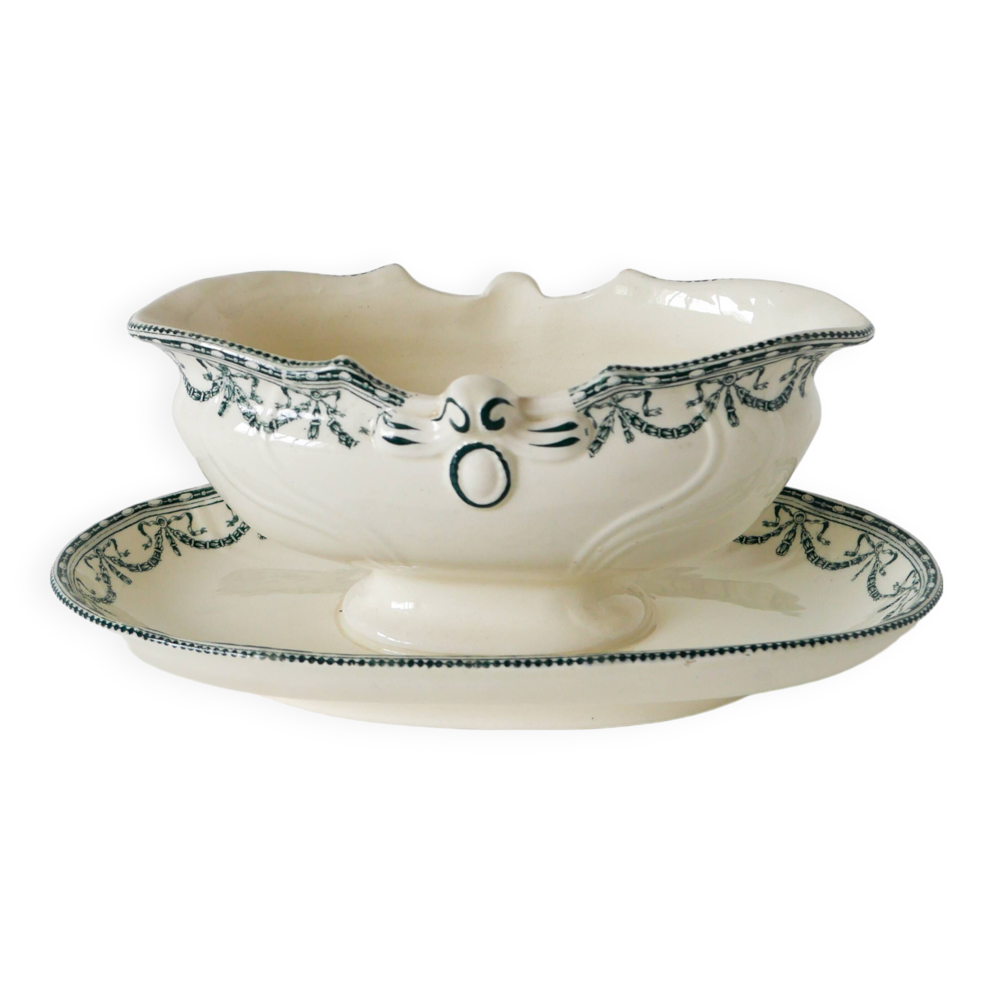 Sauce boat in Salins Iron Earth, "Guirlandes" model, textured version, early 20th century