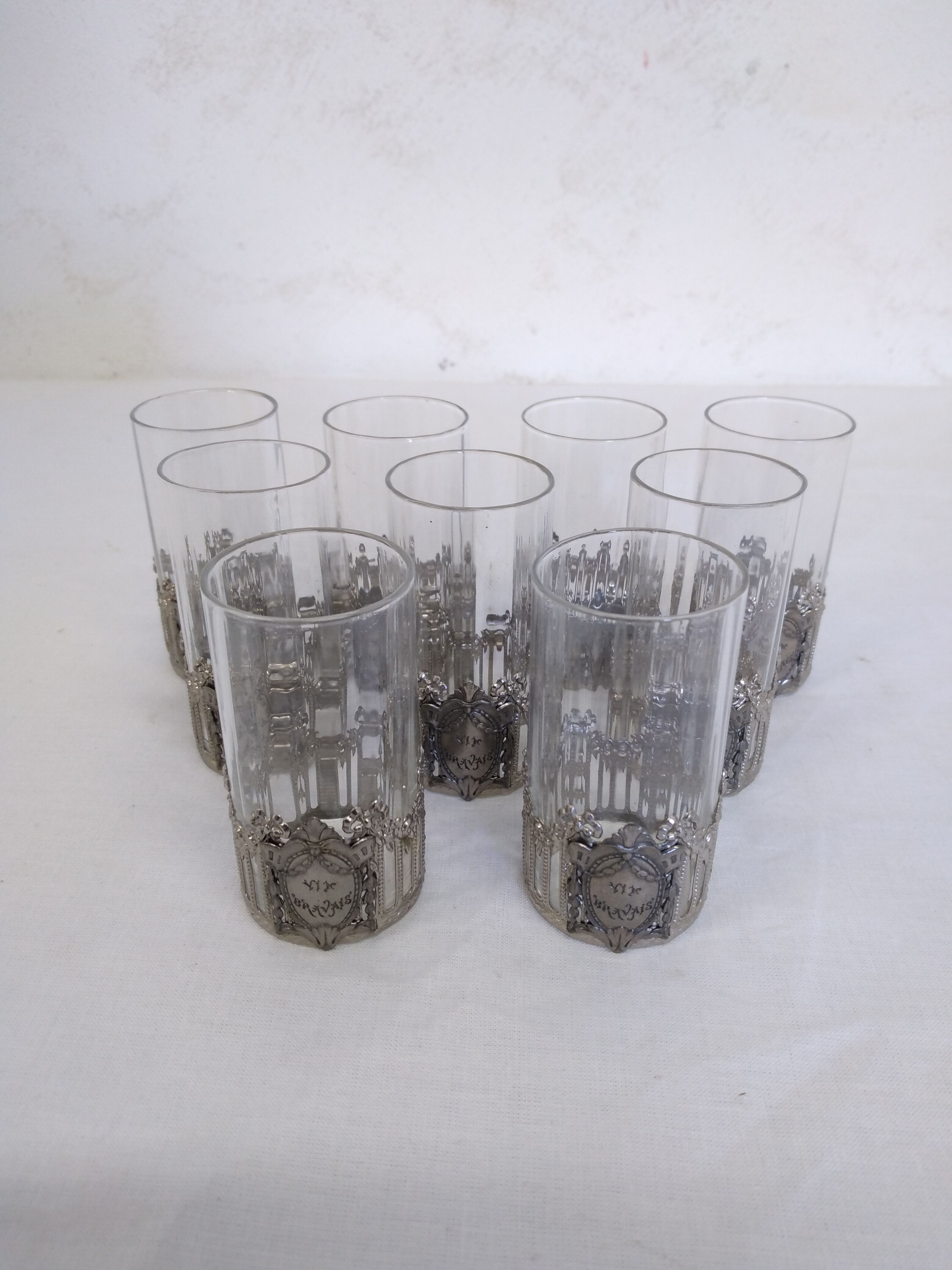 Glass with art deco strapping