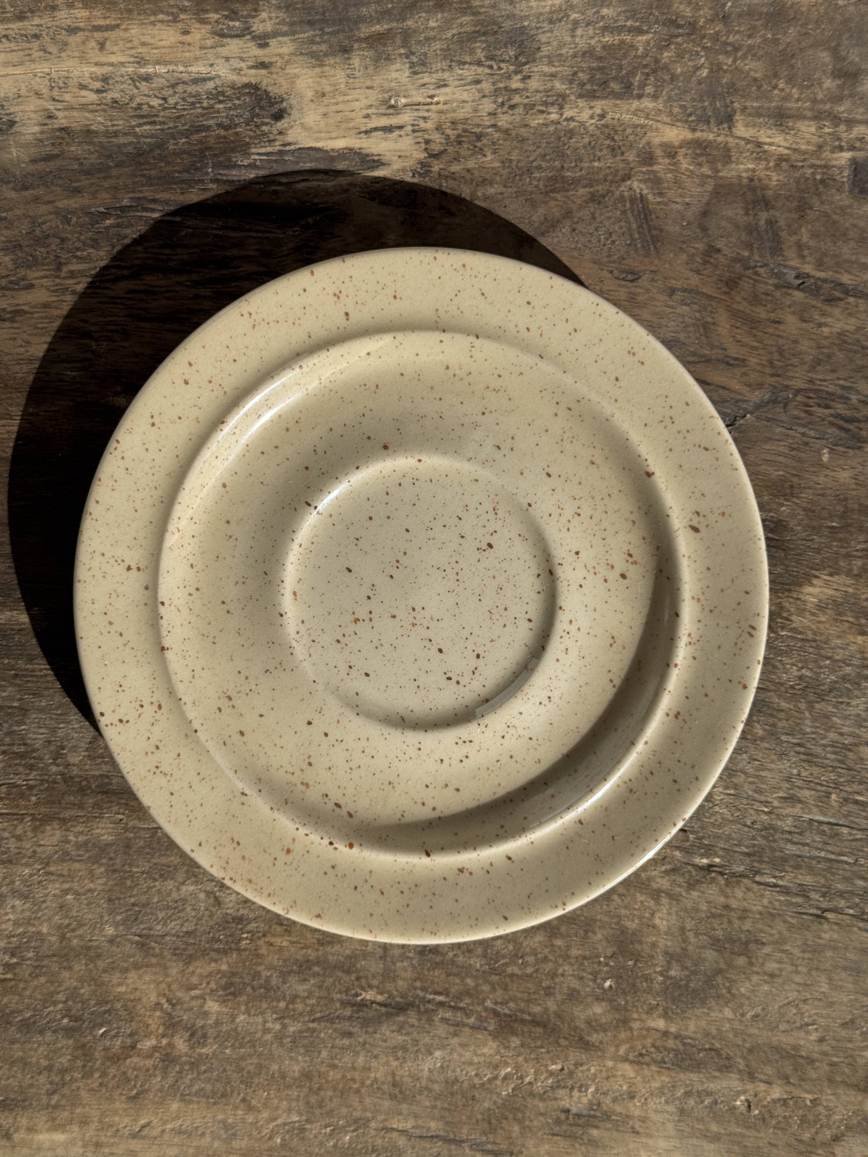 Set of 4 vintage speckled beige stoneware coffee cups.